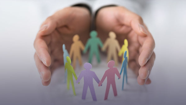 "Diversity, Equality, Inclusion, and Wellness, by Julia Steward, Founder & CEO" -blog post banner image graphic showing two cupped hands around people-shaped paper cutouts formed in a circle with each cutout in a different paper color.