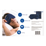Product image of the back of the Alurx Sleep Mask and Travel Pouch set: blocks light, mulberry silk, skin loving, cooling features shown next to a female model sleeping in bed wearing the mask.
