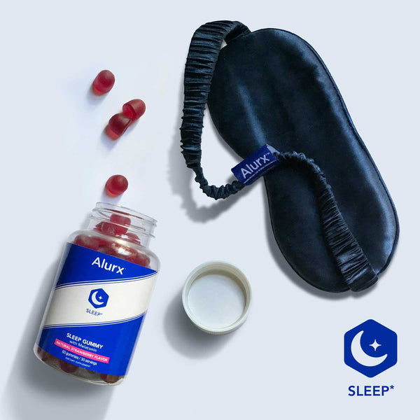Sleep Ritual set photo: shows 100% silk eye mask and Alurx Sleep Gummies with Melatonin bottle with gummies